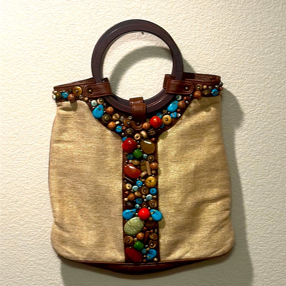 Brand new G Series beaded tote.